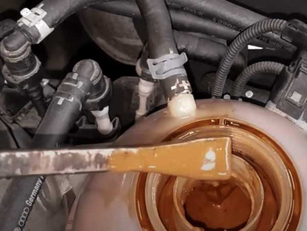 Reasons For Oil In The Coolant Reservoir But Car Not Overheating