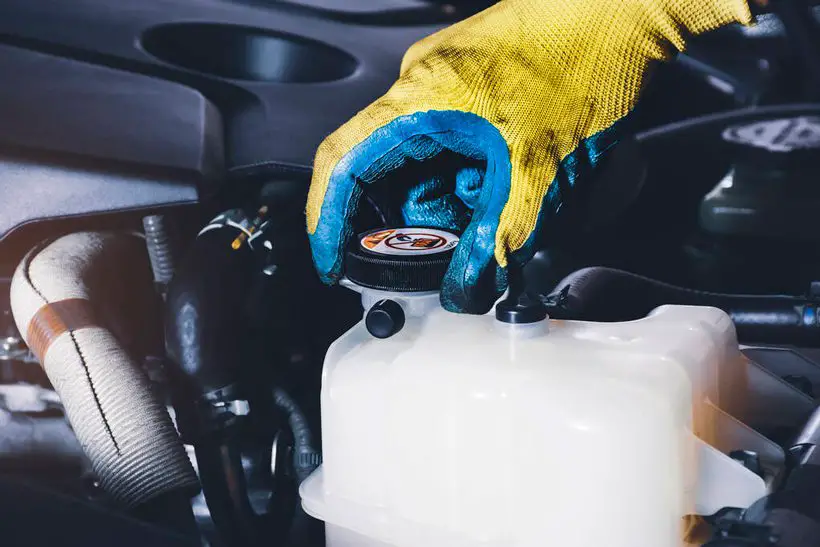 Checking the level of coolant in a car